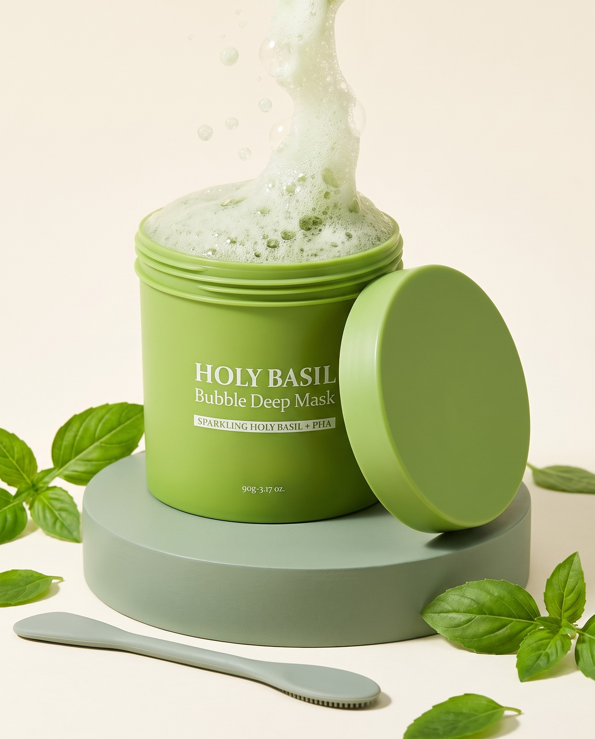 Holy Basil Bubble Clay Mask jar, open and fizzing, with its lid and basil leaves