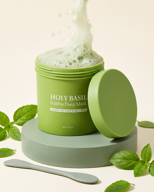 Holy Basil Bubble Clay Mask jar, open and fizzing, with its lid and basil leaves